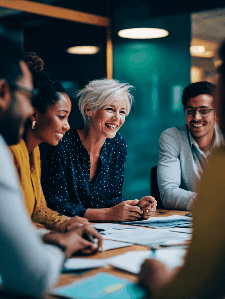 InovAcc A warm scene of a small team meeting